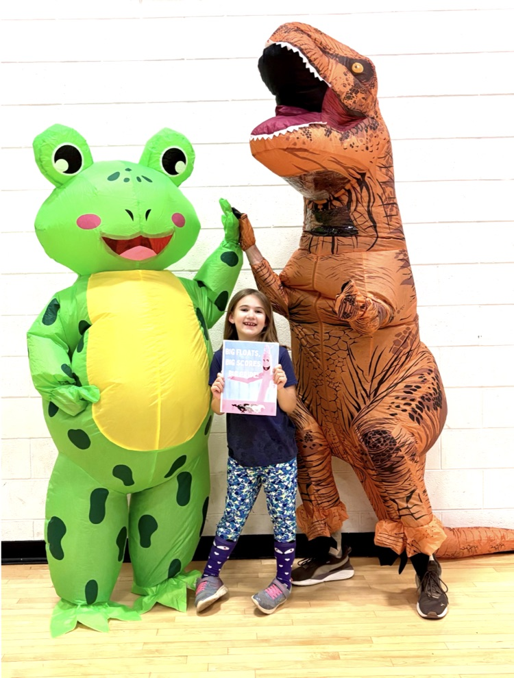 2nd grader with inflatable costumes
