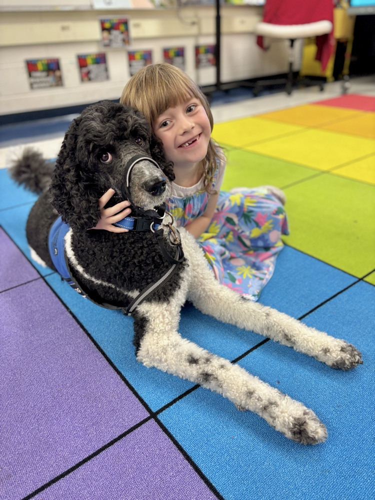 student with facility dog
