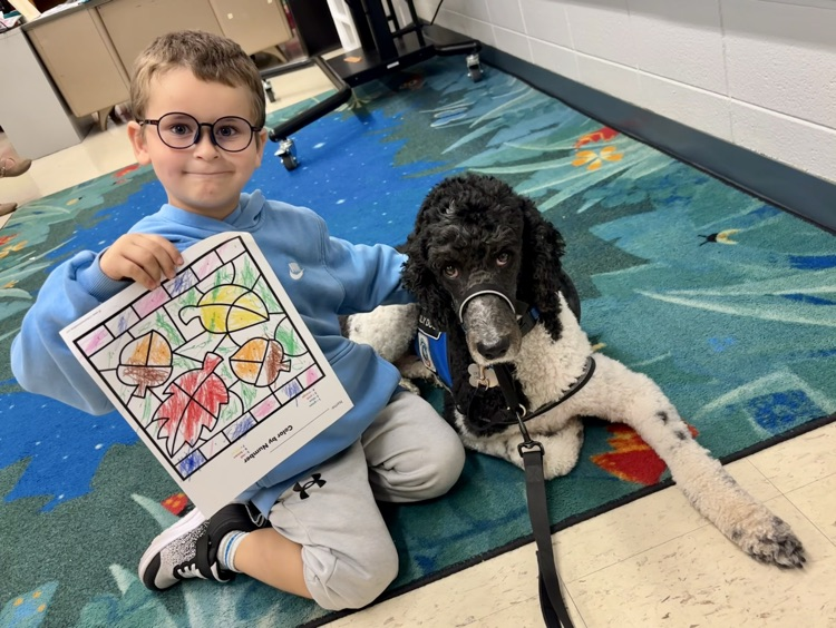 student and dog