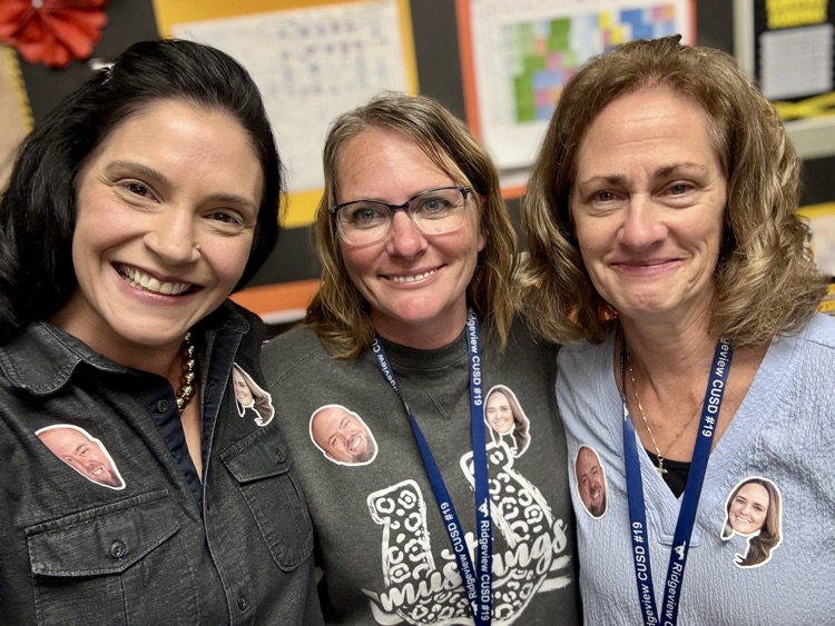 teachers wearing principals face stickers