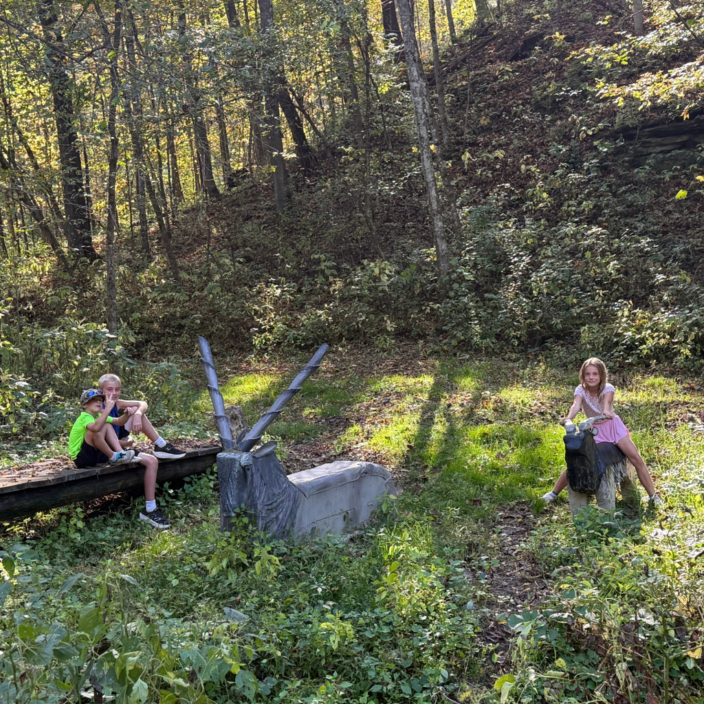 Riding the goats during snack break.