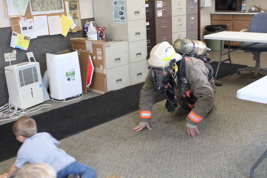 Firefighter crawling