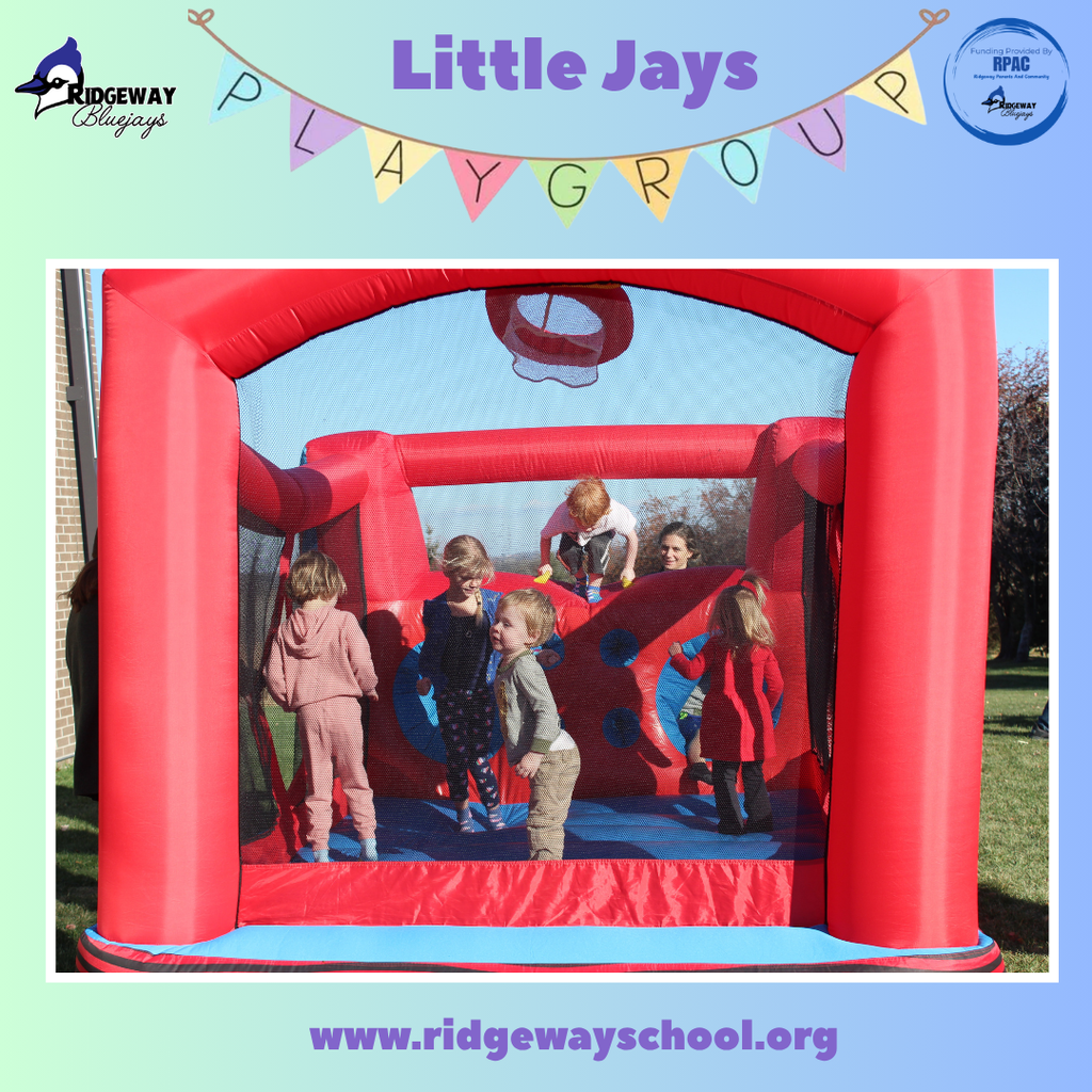 Children playing on the bounce house