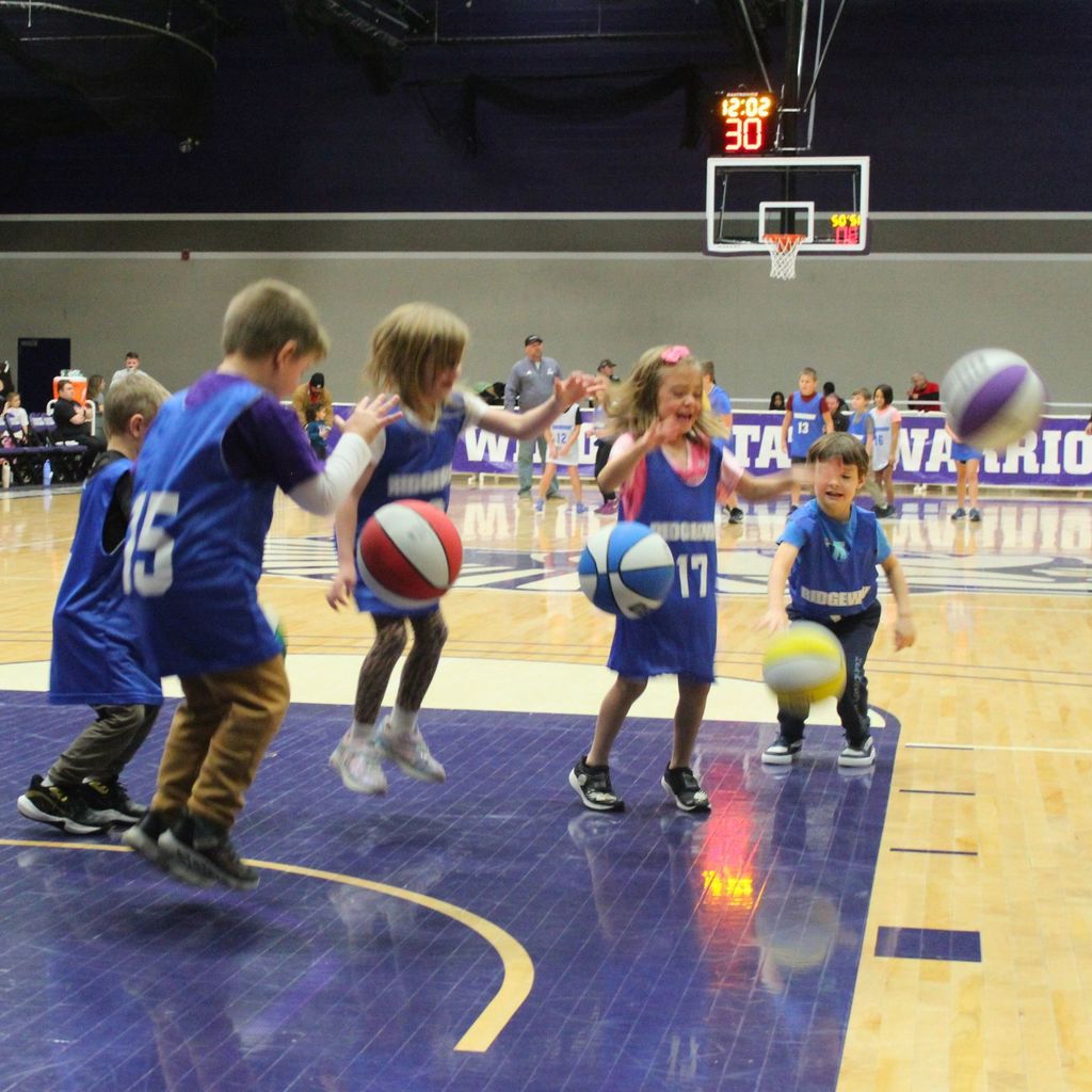 Ridgeway 2nd to 5th grade players doing a dribbling drill