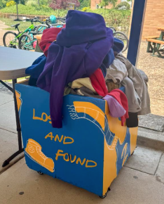Lost & Found Bin with clothes overflowing