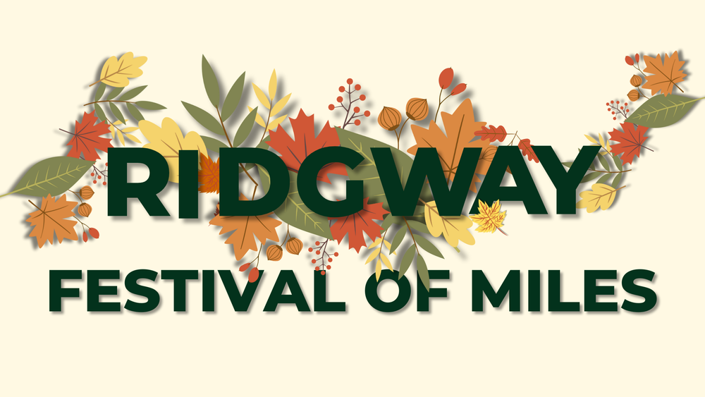 Ridgway Festival of Miles with fall leaves in the background 