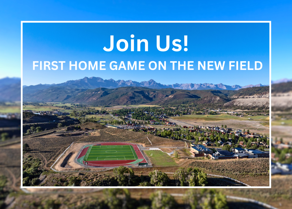A wide aerial view of a new soccer and track field surrounded by mountains, with text overlay: “Join Us! First Home Game on the New Field.”
