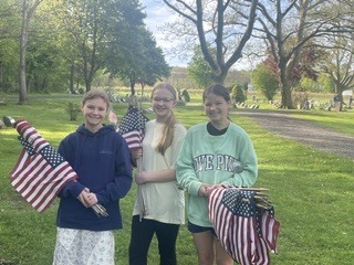 The community of Ripley Central School comes alive with gratitude as sixth graders unite to honor local heroes. Stepping outside the classroom, these young students carry a profound mission to ensure no veteran's sacrifice is forgotten. With quiet respect, they walk the cemetery grounds to place a bright American flag at each headstone. This moving tribute bridges generations, transforming a simple history lesson into a lifelong memory of civic pride. Reading the names carved in stone brings the true cost of freedom into sharp, personal focus. As row after row of flags catches the morning light, the students see the powerful visual impact of their collective gratitude. Through this heartfelt service, Ripley's youngest citizens keep the legacy of our fallen protectors beautifully alive.