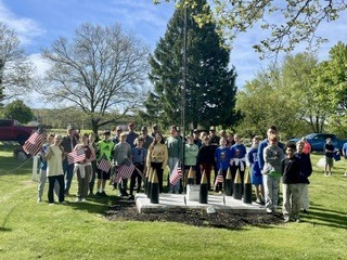 The community of Ripley Central School comes alive with gratitude as sixth graders unite to honor local heroes. Stepping outside the classroom, these young students carry a profound mission to ensure no veteran's sacrifice is forgotten. With quiet respect, they walk the cemetery grounds to place a bright American flag at each headstone. This moving tribute bridges generations, transforming a simple history lesson into a lifelong memory of civic pride. Reading the names carved in stone brings the true cost of freedom into sharp, personal focus. As row after row of flags catches the morning light, the students see the powerful visual impact of their collective gratitude. Through this heartfelt service, Ripley's youngest citizens keep the legacy of our fallen protectors beautifully alive.