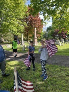 The community of Ripley Central School comes alive with gratitude as sixth graders unite to honor local heroes. Stepping outside the classroom, these young students carry a profound mission to ensure no veteran's sacrifice is forgotten. With quiet respect, they walk the cemetery grounds to place a bright American flag at each headstone. This moving tribute bridges generations, transforming a simple history lesson into a lifelong memory of civic pride. Reading the names carved in stone brings the true cost of freedom into sharp, personal focus. As row after row of flags catches the morning light, the students see the powerful visual impact of their collective gratitude. Through this heartfelt service, Ripley's youngest citizens keep the legacy of our fallen protectors beautifully alive.