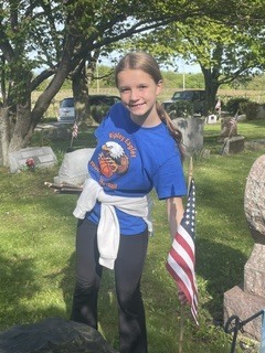 The community of Ripley Central School comes alive with gratitude as sixth graders unite to honor local heroes. Stepping outside the classroom, these young students carry a profound mission to ensure no veteran's sacrifice is forgotten. With quiet respect, they walk the cemetery grounds to place a bright American flag at each headstone. This moving tribute bridges generations, transforming a simple history lesson into a lifelong memory of civic pride. Reading the names carved in stone brings the true cost of freedom into sharp, personal focus. As row after row of flags catches the morning light, the students see the powerful visual impact of their collective gratitude. Through this heartfelt service, Ripley's youngest citizens keep the legacy of our fallen protectors beautifully alive.