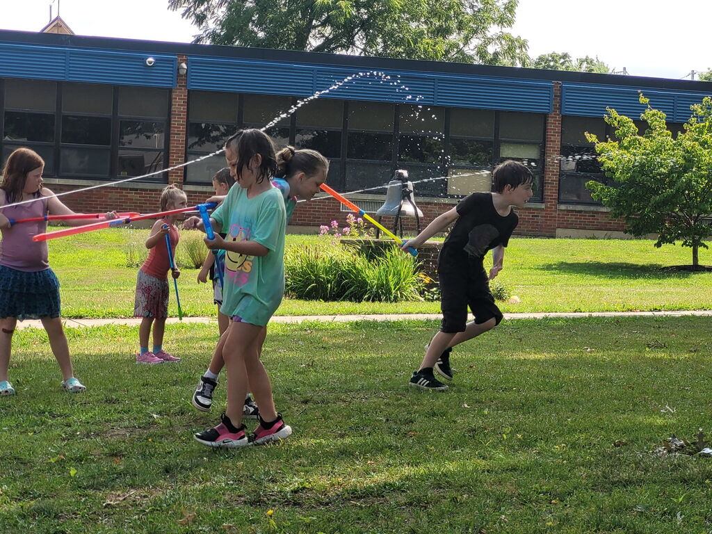 Kids playing water wars