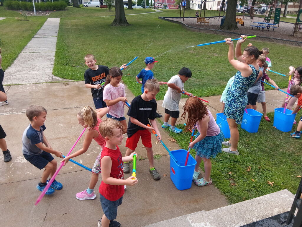 Kids playing water wars