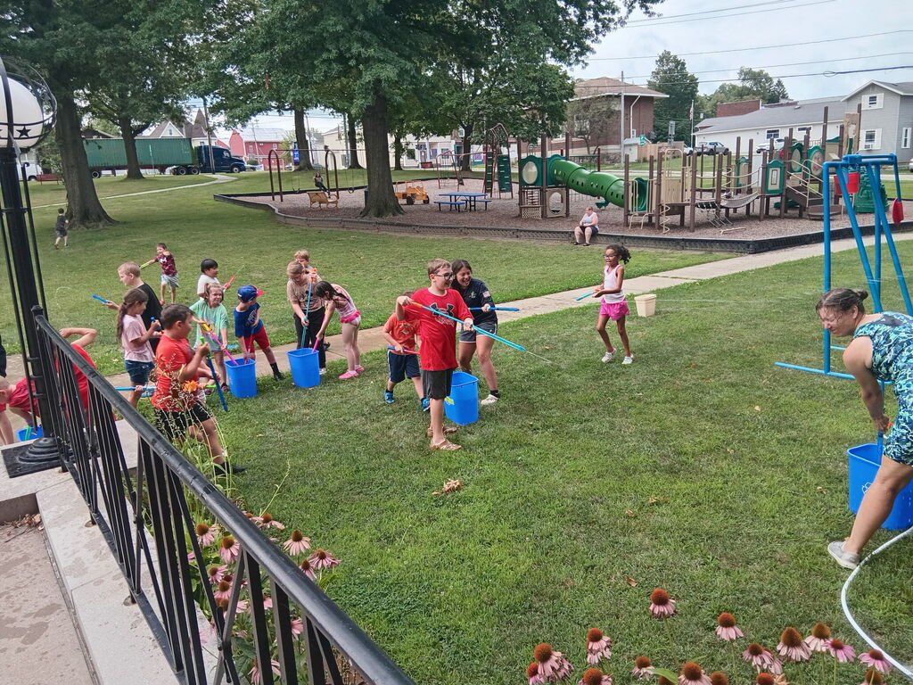 Kids playing water wars