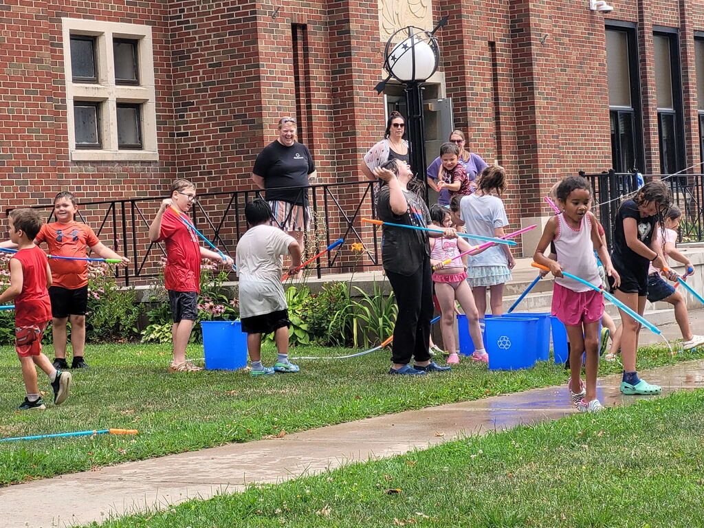 Kids playing water wars