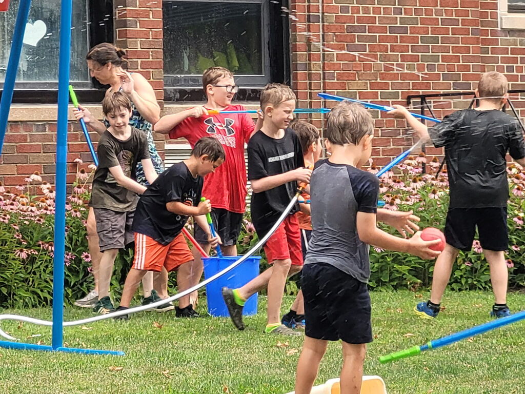 Kids playing water wars
