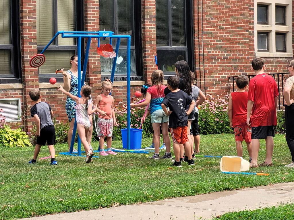 Kids playing water wars