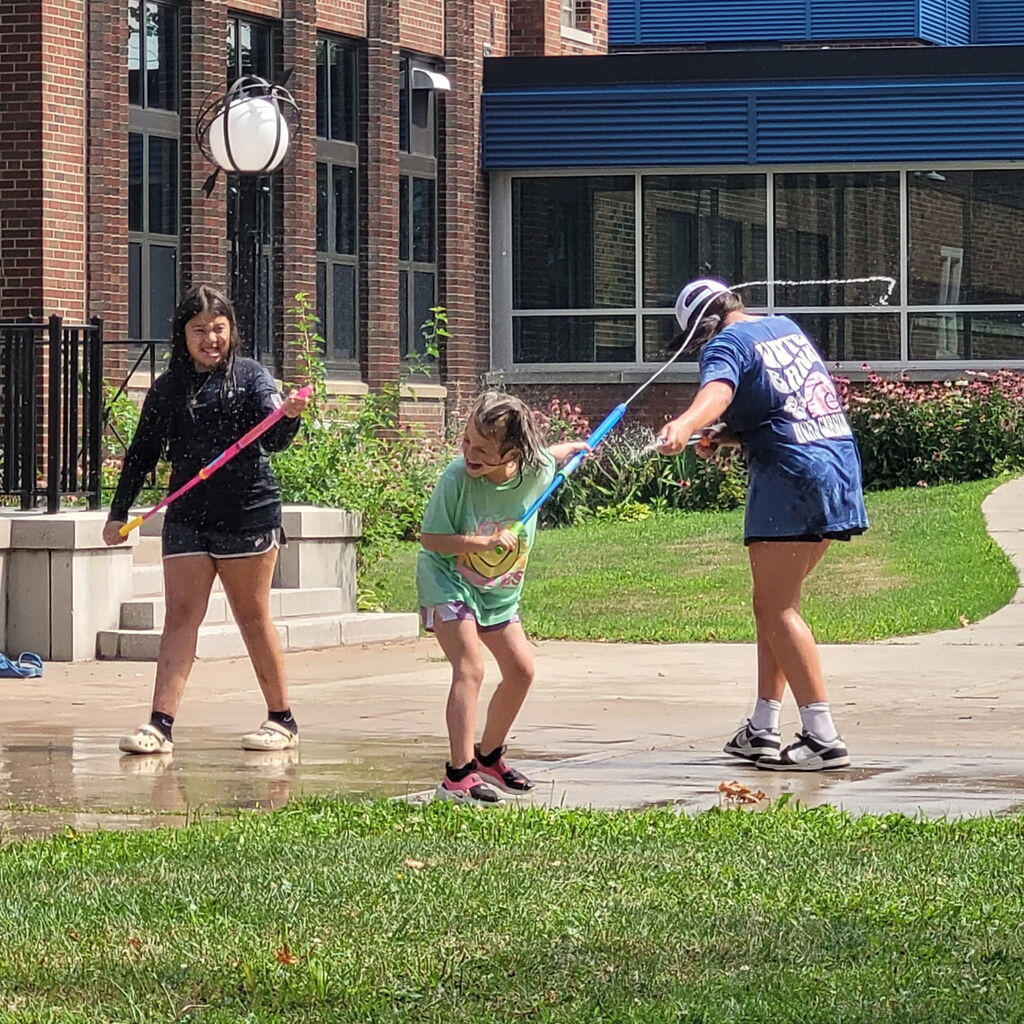 Kids playing water wars