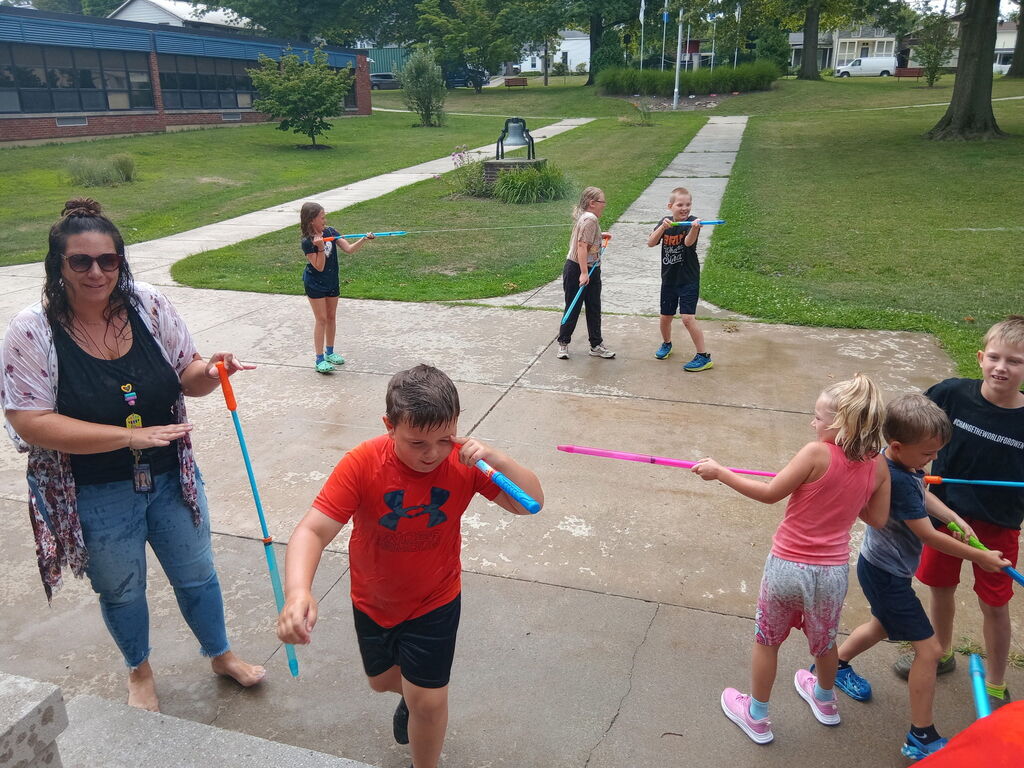 Kids playing water wars