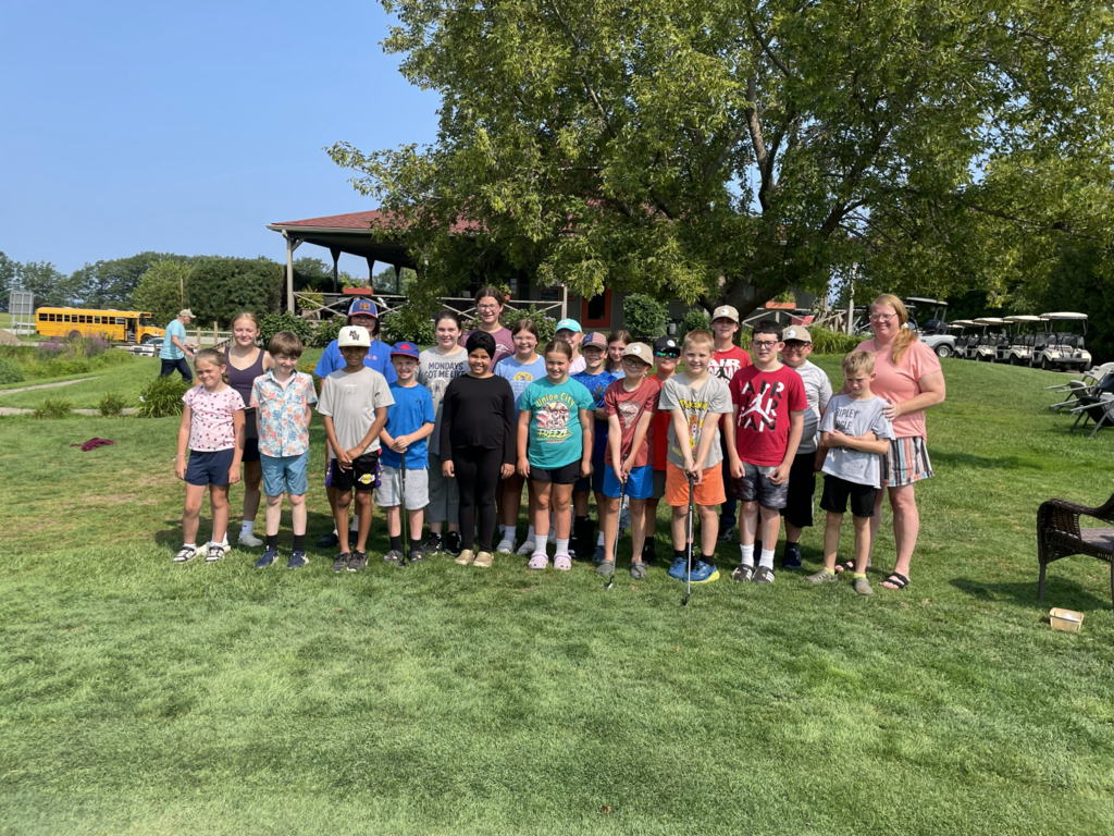 Group picture of all the students that participated in the golf club during Eagle U 2026