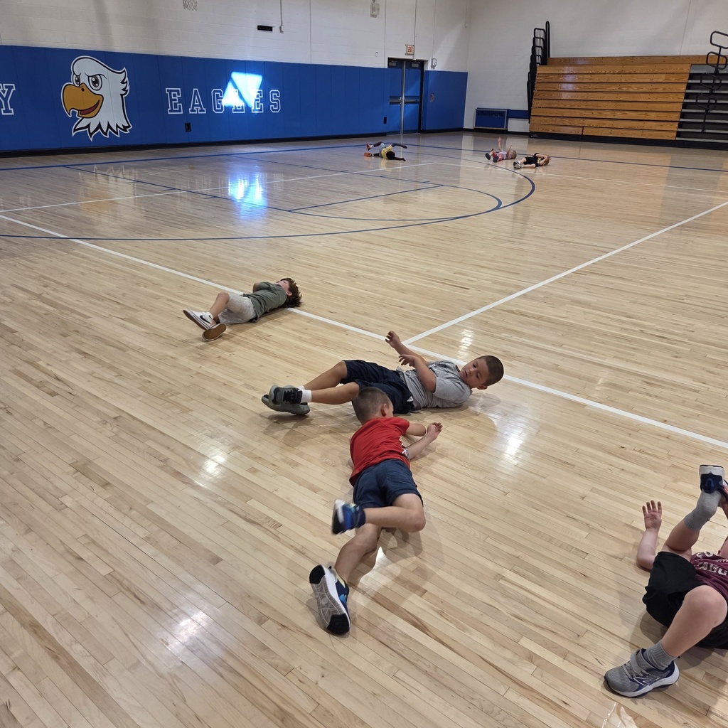 Several students rolling in PE class