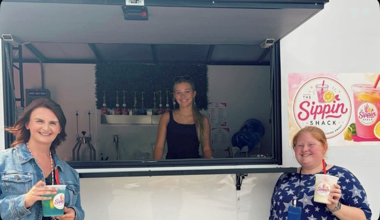 for the first day back to school staff members were served by the sippin shack
