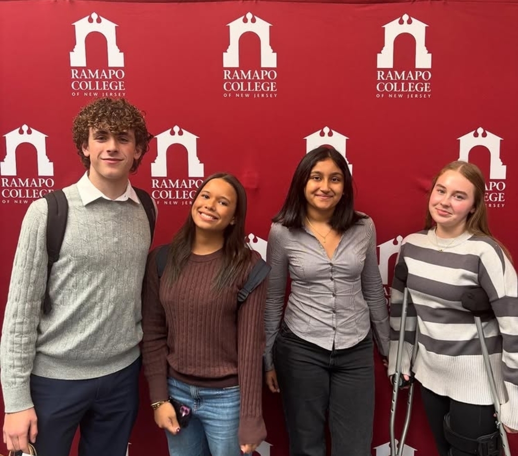 Students in front of Ramapo College background