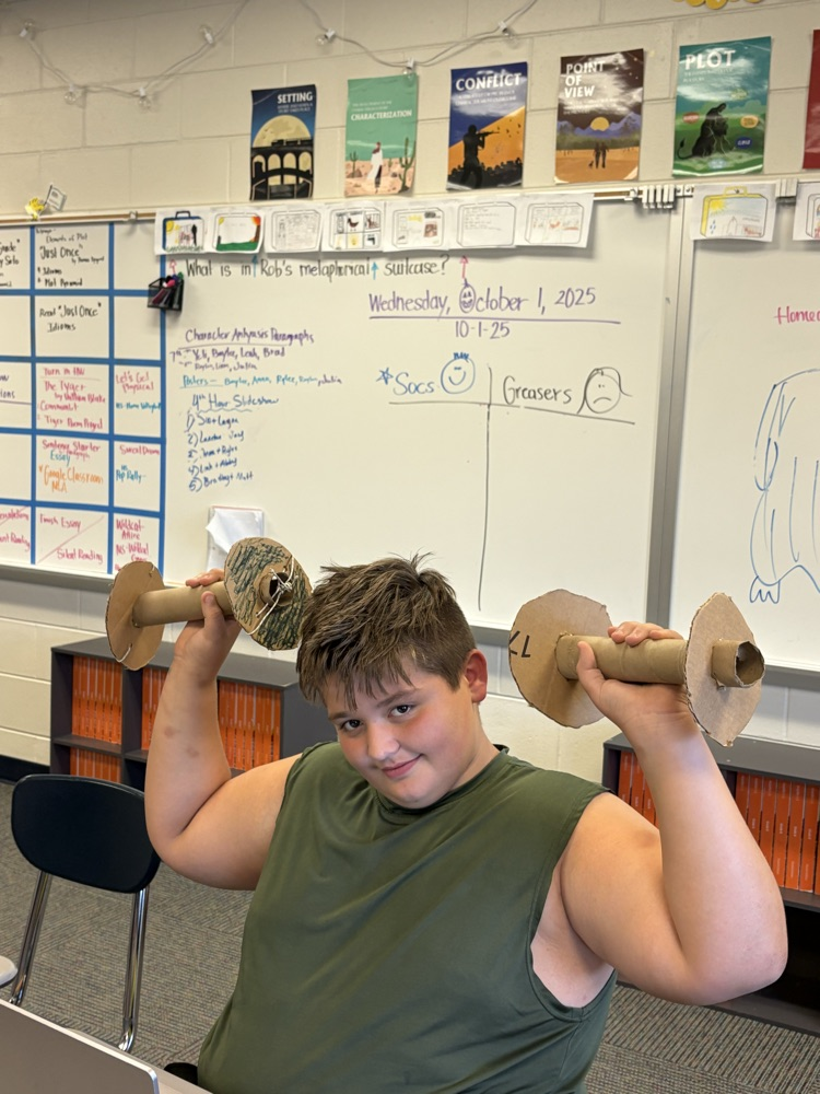 Liam Boop lifting weights.