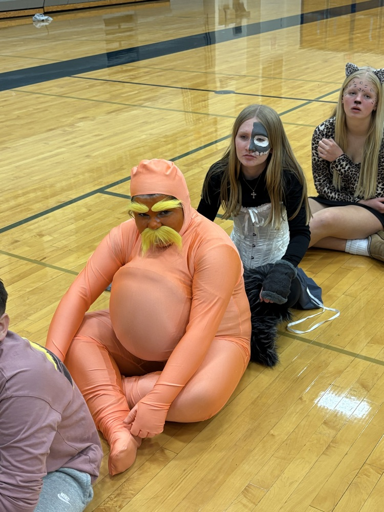 8th graders in line for a Halloween 🎃 game.