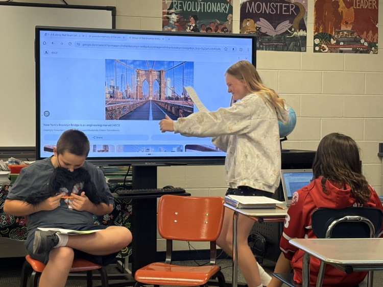 6th grade students reading a play.