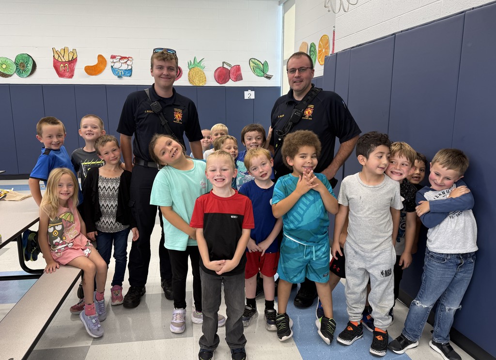 Students with Chikaming Township Firefighters