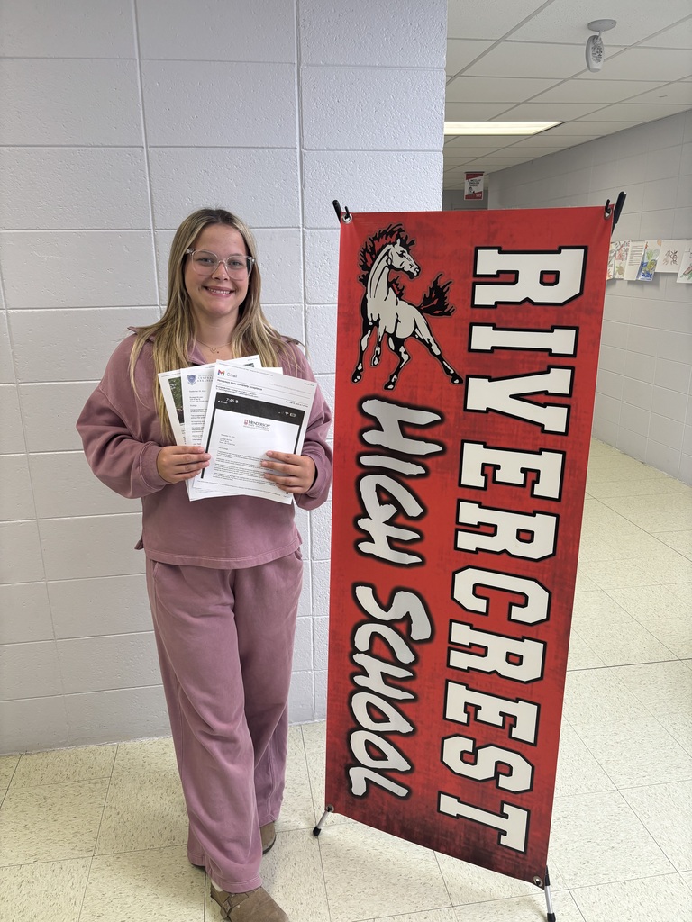 student accepting scholarship