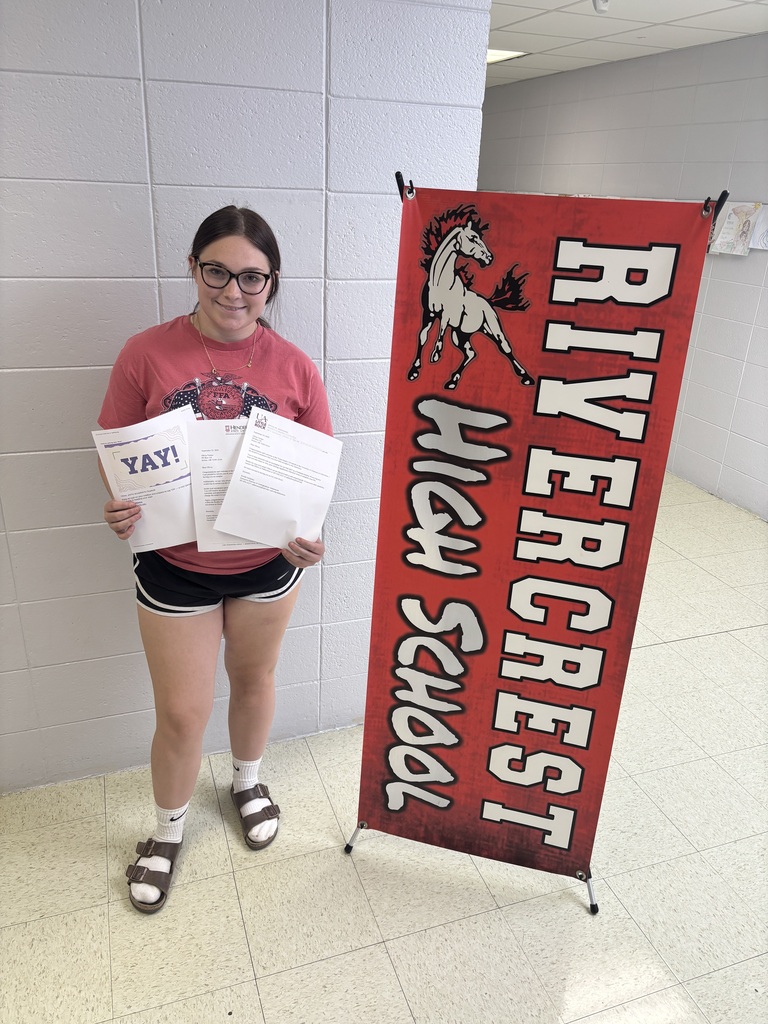 student accepting scholarship