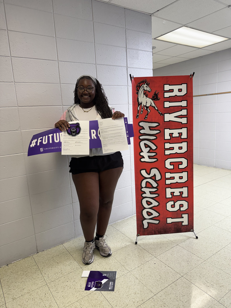 Girl holding college acceptance letters.