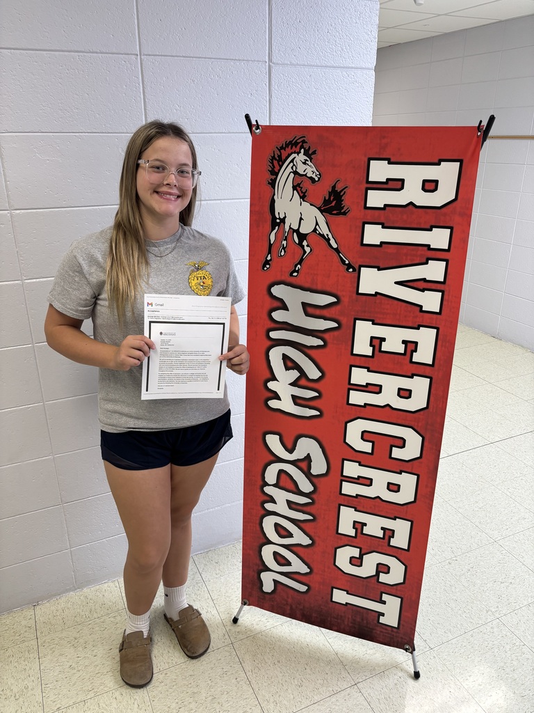 Girl holding college acceptance letter