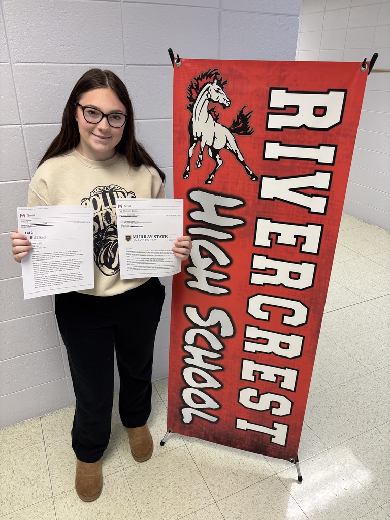 Girl holding college acceptance letters