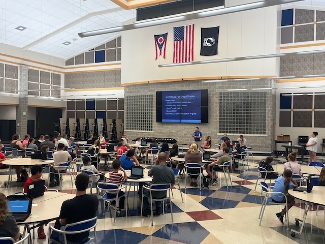 6th Grade Orientation at RHS Cafeteria, Mr. Alex Shumaker presenting to parents and students