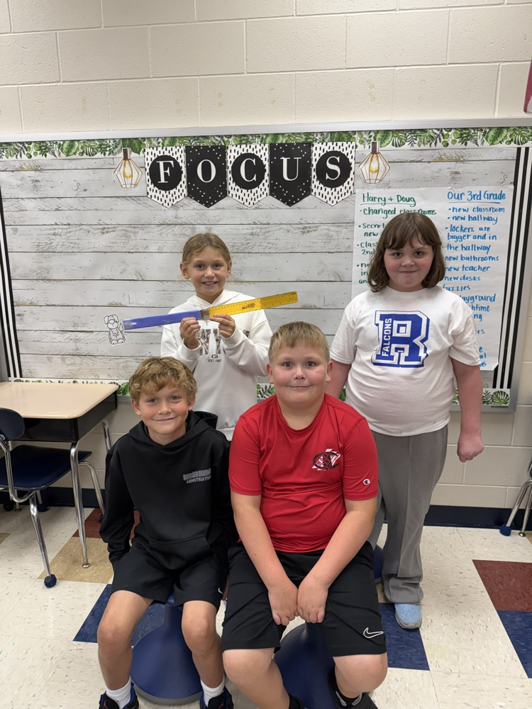 students with their completed leash