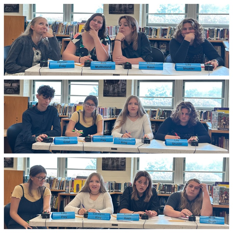 Image of Quiz Bowl team competing