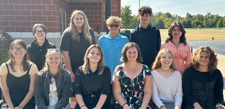 Image of Quiz Bowl team posing outside 