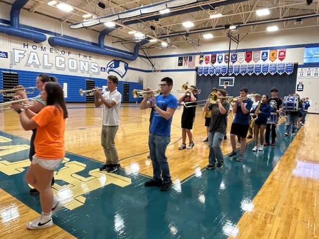 RHS Marching Band & Homecoming Court procession to end the school day.. 