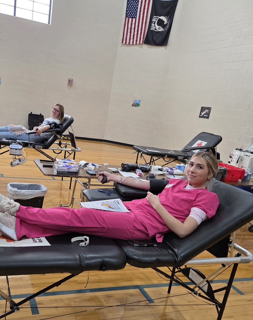 Paige and Lilly donating blood
