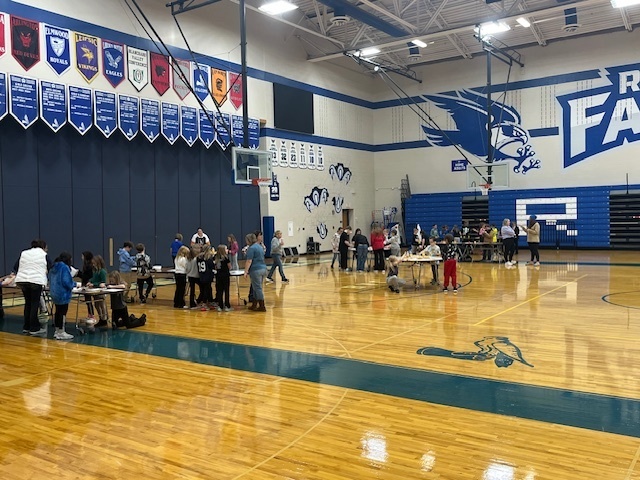 K-5 Falcon students engaging in STEM Activities in the gym