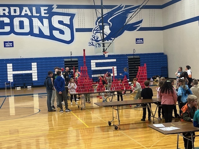 K-5 Falcon students engaging in STEM Activities in the gym