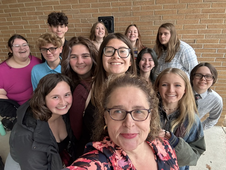 Quiz Bowl team with coach