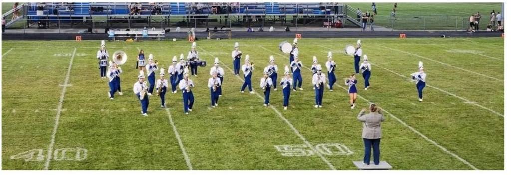 Riverdale Marching performing on the football field.