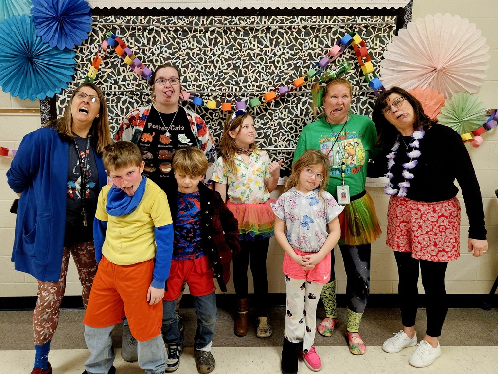 Crazy face pictures, of staff and students wearing mismatched outfits!