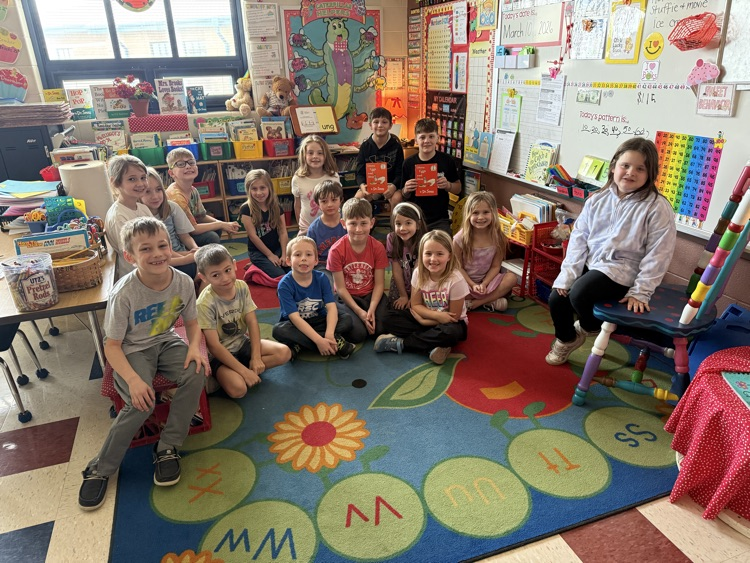 5th graders reading to 1st graders! 