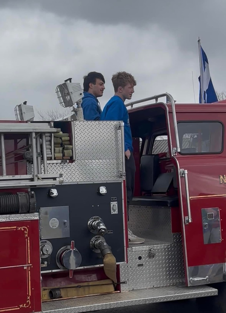 kydin and Grady on the firetruck.