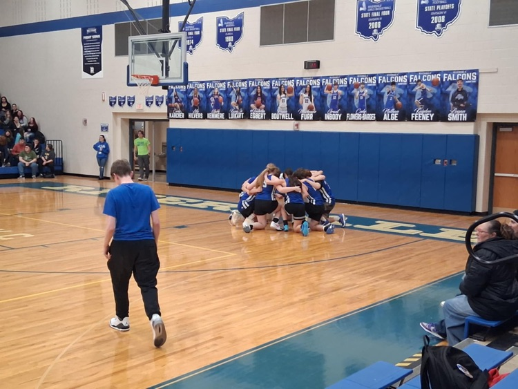 student team huddling up